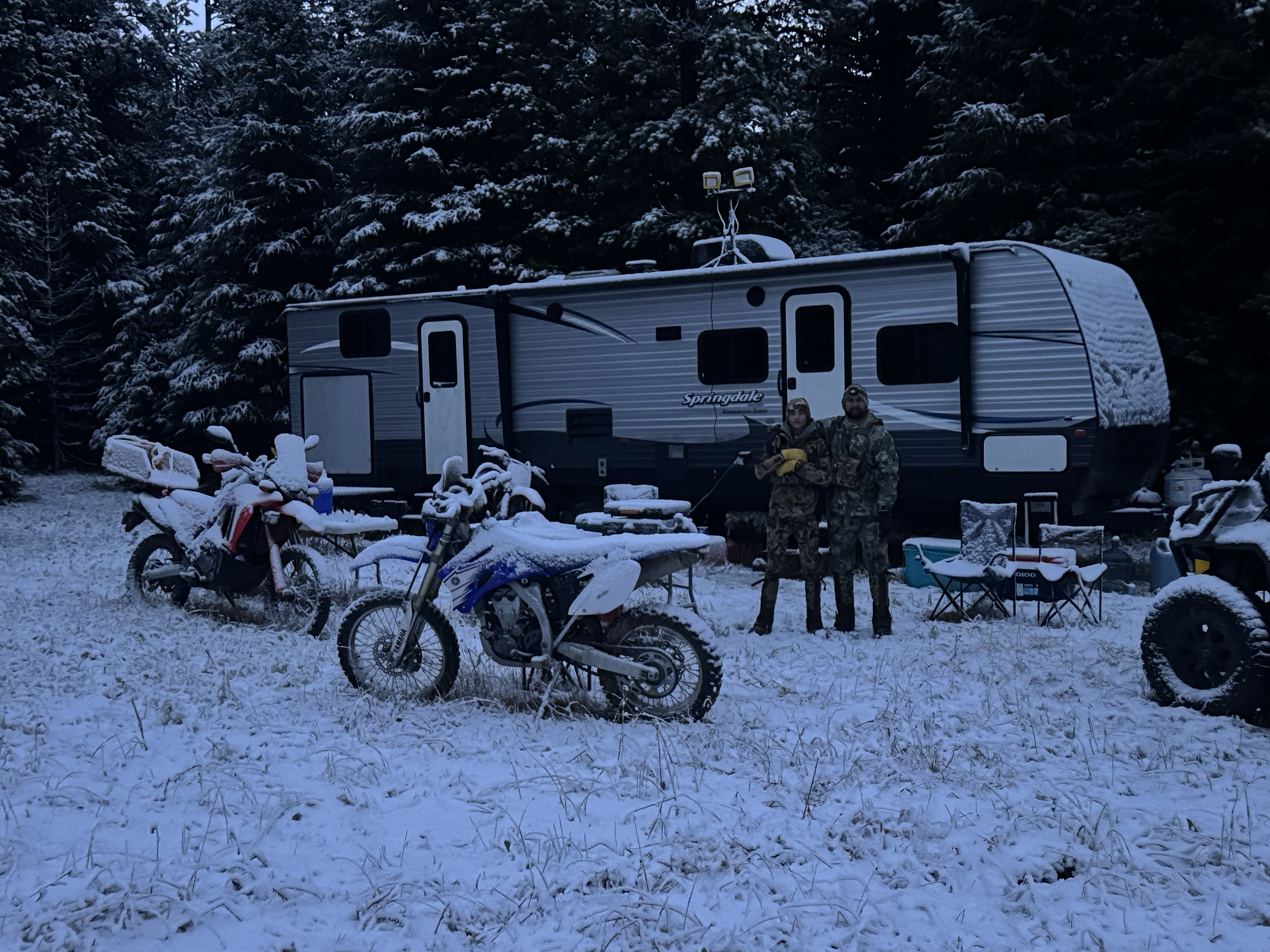 Camper parked at an outdoor basecamp